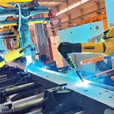 เวิร์คสเตชั่นการเชื่อมหุ่นยนต์บีม